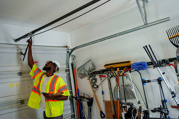 Professional Garage Door Panel Replacement technician working in Denver, IA